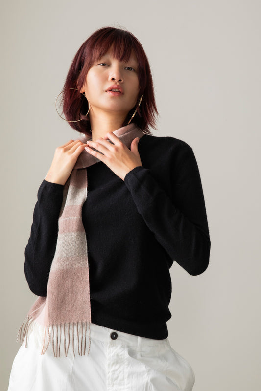 Peach and pink checked lambswool scarf.