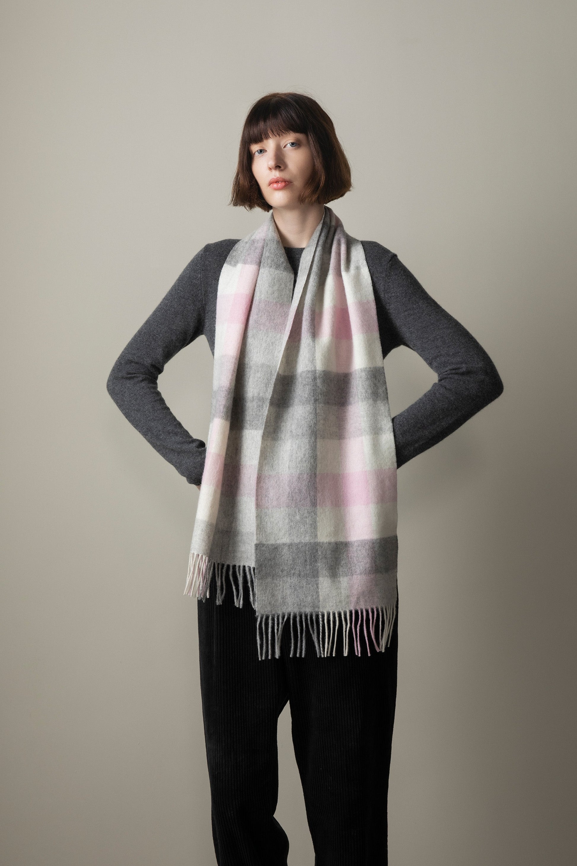 Soft grey and pink checked lambswool scarf by Kiltane.