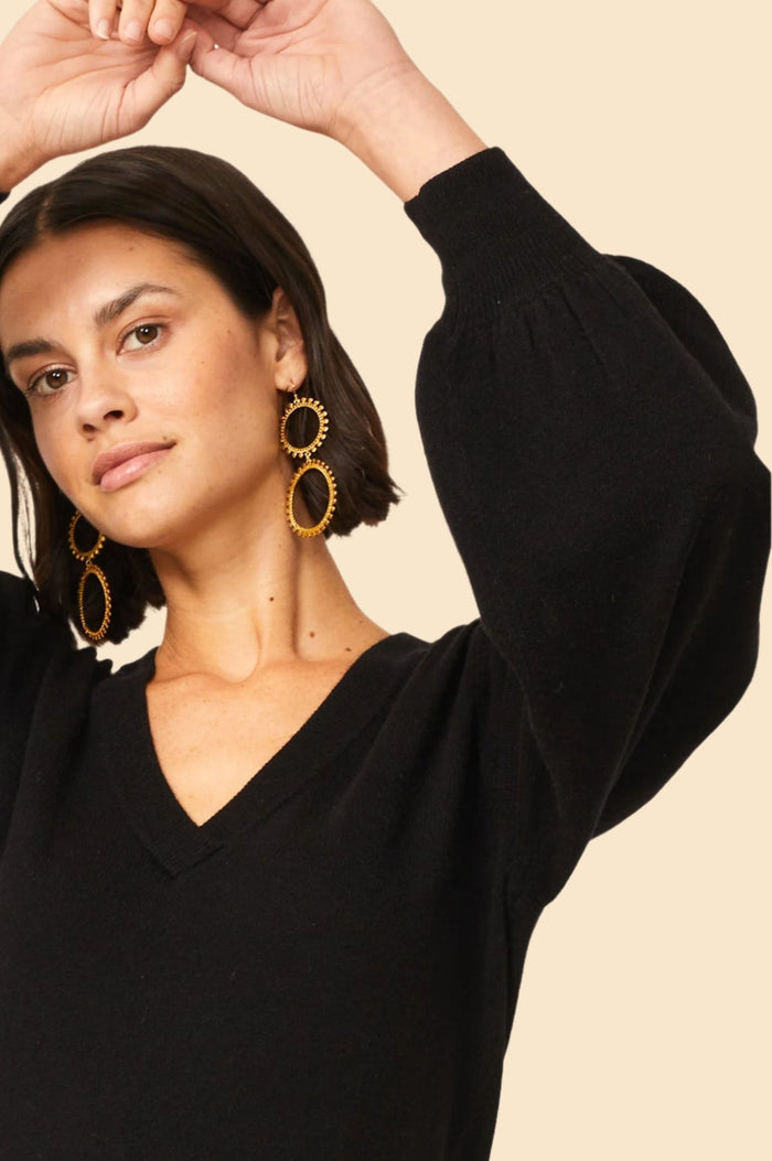 Black balloon sleeve v-neck jumper in merino cashmere blend.