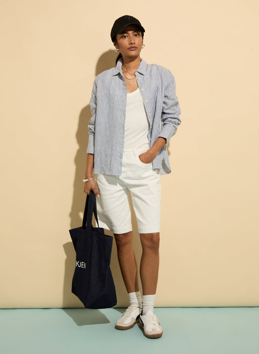 Soft white organic cotton denim shorts.