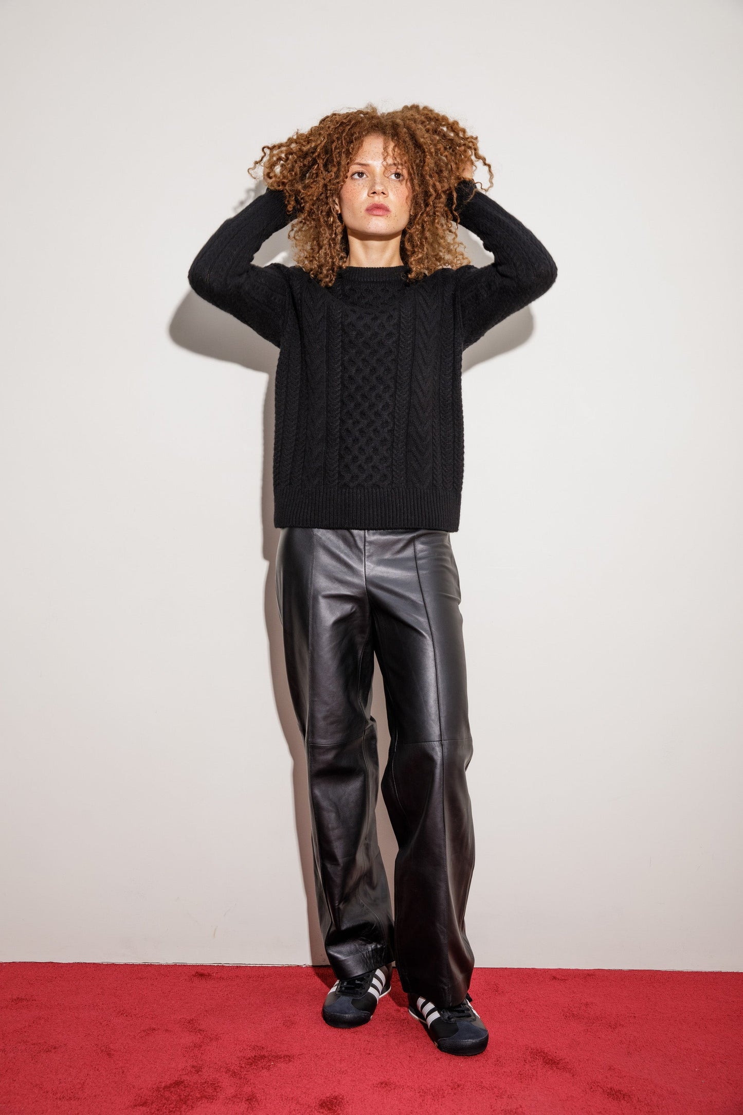 Black 100% cashmere cable knit sweater by Kiltane.